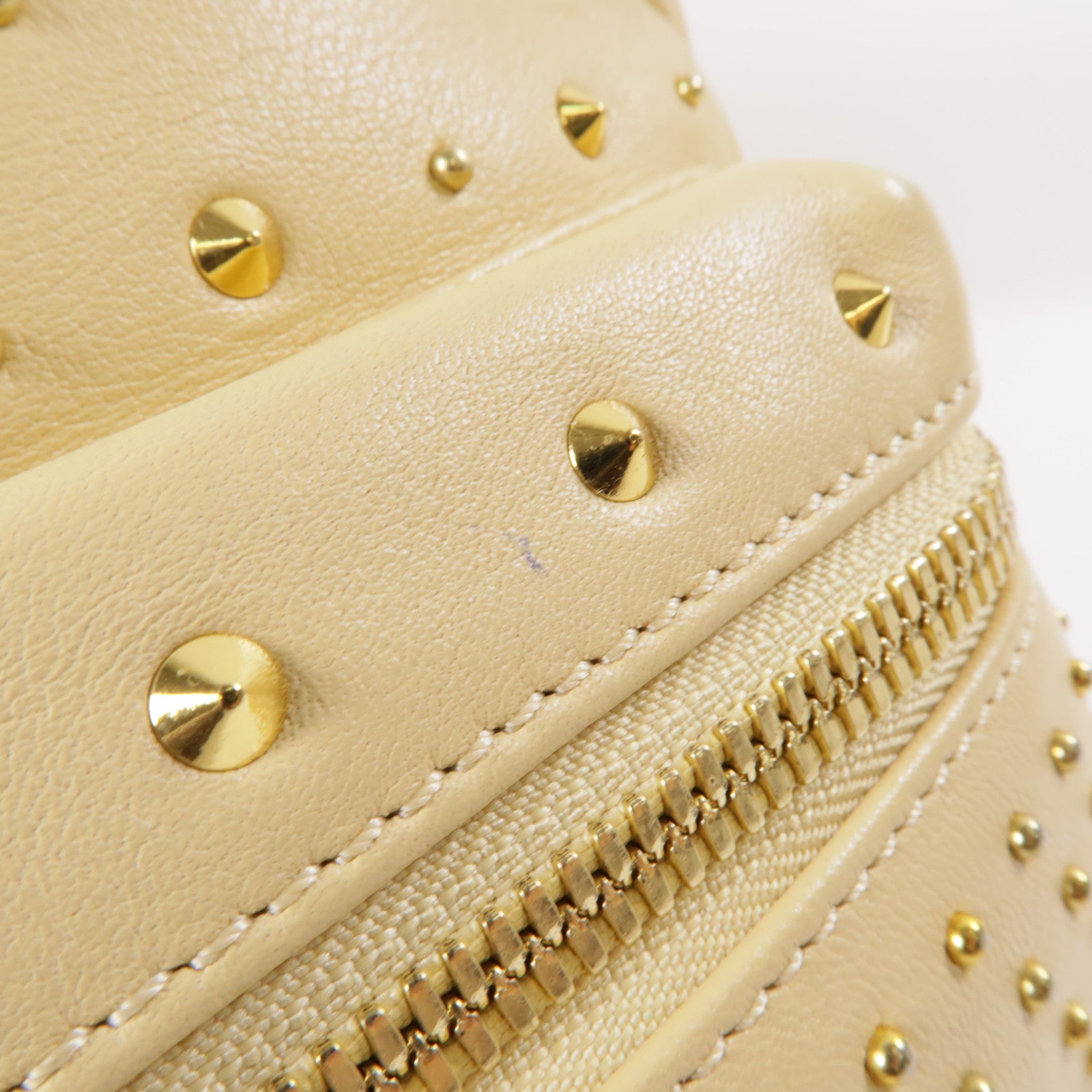 MCM 牛皮皮革Backpack金扣背包米色