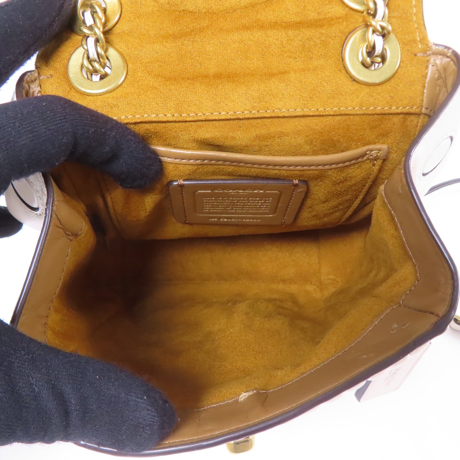 COACH 牛皮皮革Rucksack金扣鏈帶背包