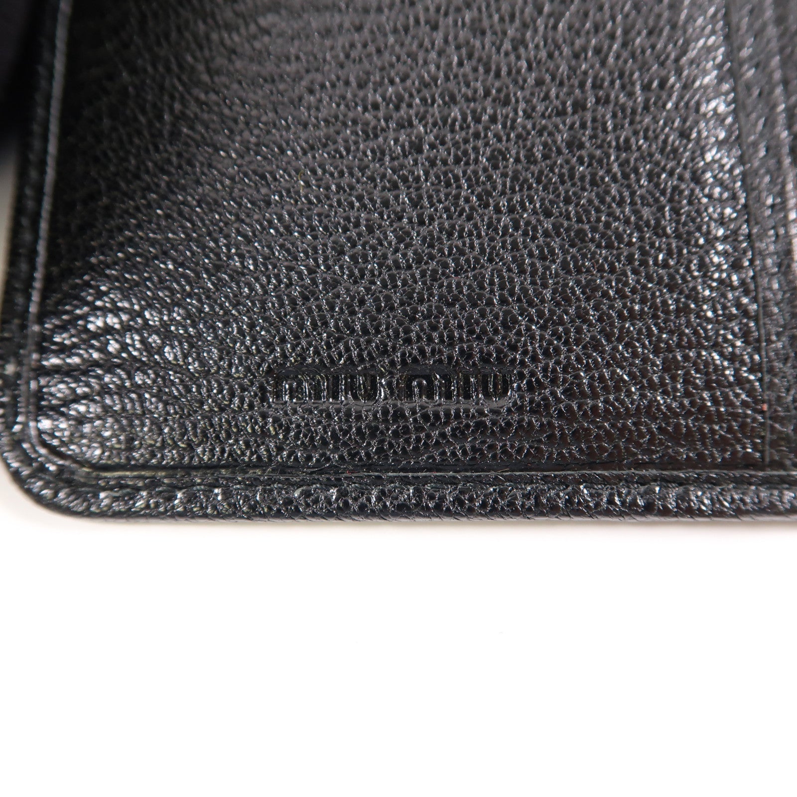 Miu Miu 牛皮皮革Trifold Wallet金扣錢包黑色/淺褐色