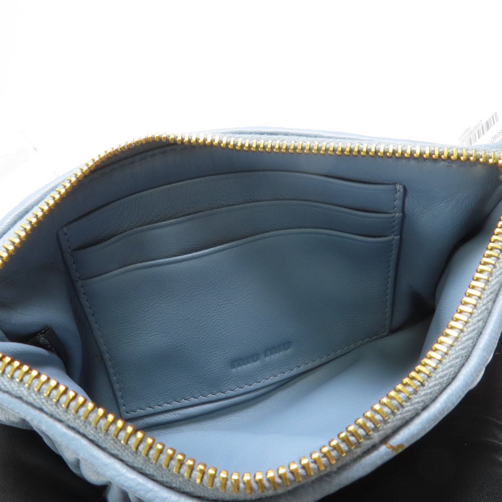 Miu Miu 羊皮皮革Pouch金扣手拿包