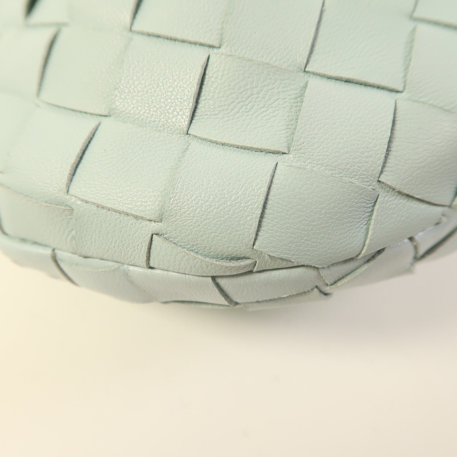 BOTTEGA VENETA 羊皮皮革Jodie金扣手挽袋