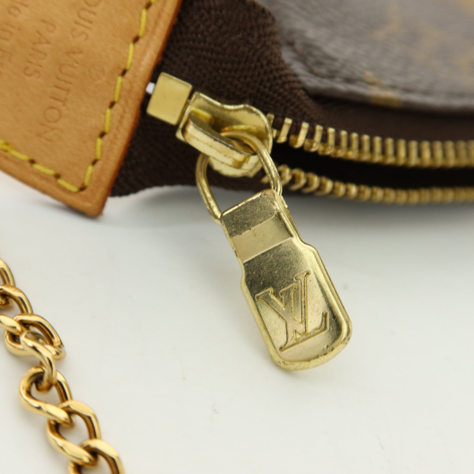 LOUIS VUITTON Monogram Mini Pochette Accessoires金扣手挽袋