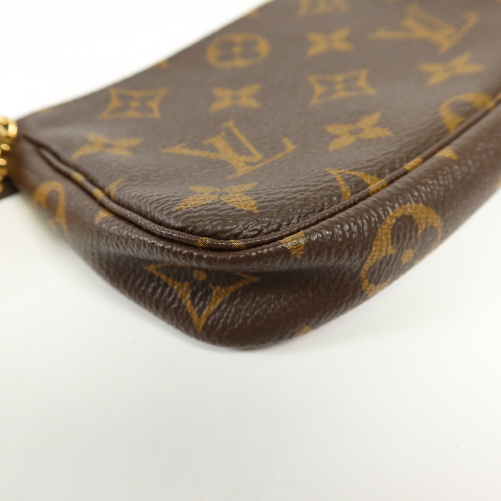 LOUIS VUITTON Monogram Mini Pochette Accessoires金扣手挽袋