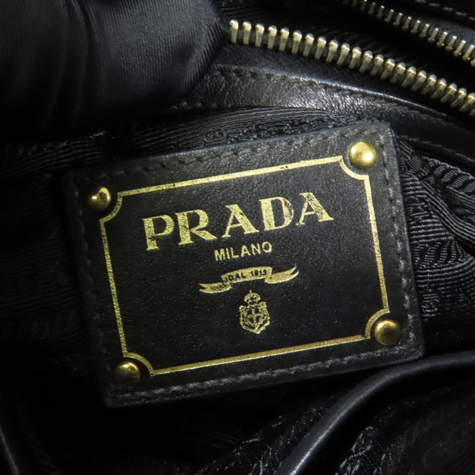PRADA 牛皮皮革Bauletto金扣手挽袋