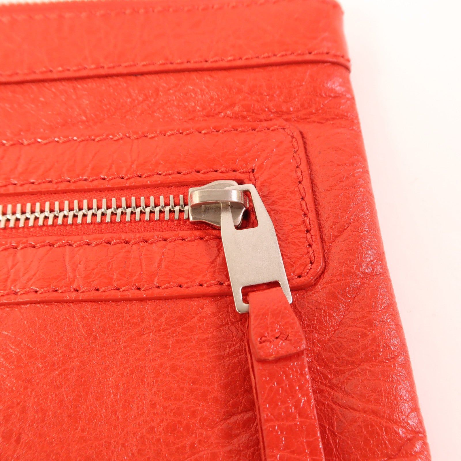 BALENCIAGA 牛皮皮革Pouch金扣手拿包