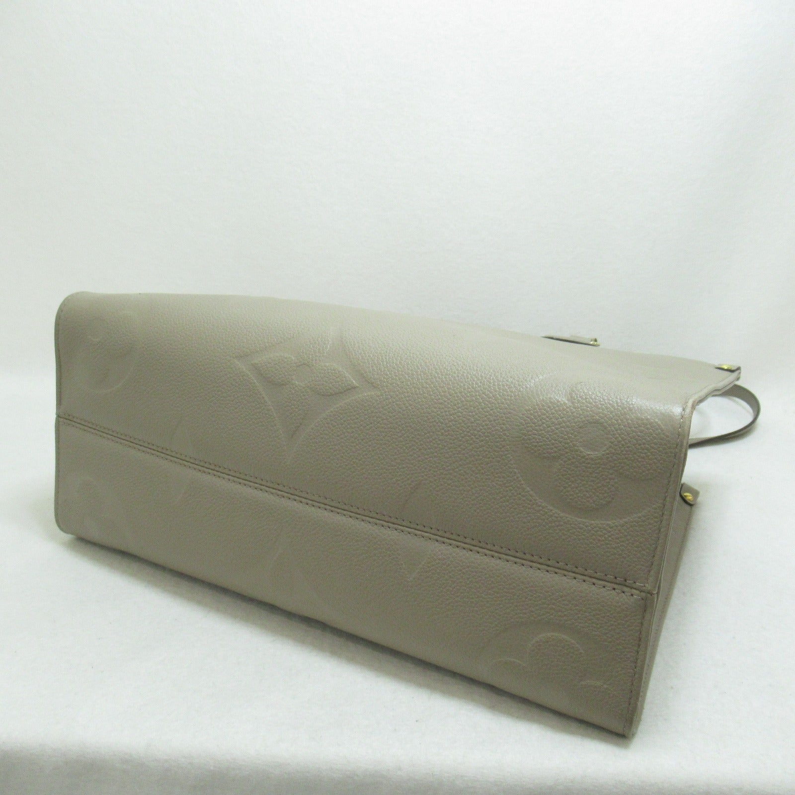 LOUIS VUITTON Monogram Empreinte OnTheGo MM金扣手挽肩背兩用袋米色