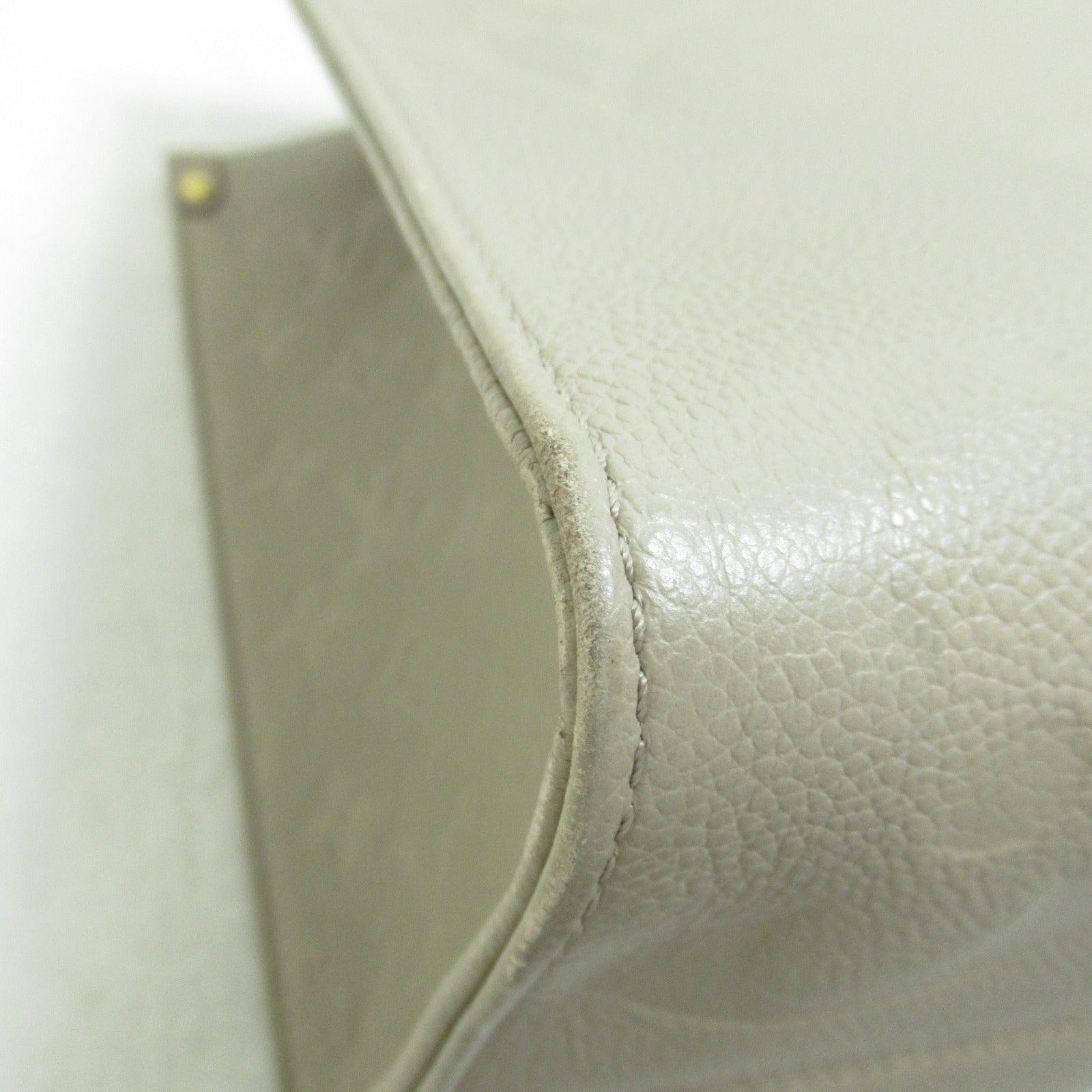 LOUIS VUITTON Monogram Empreinte OnTheGo MM金扣手挽肩背兩用袋米色