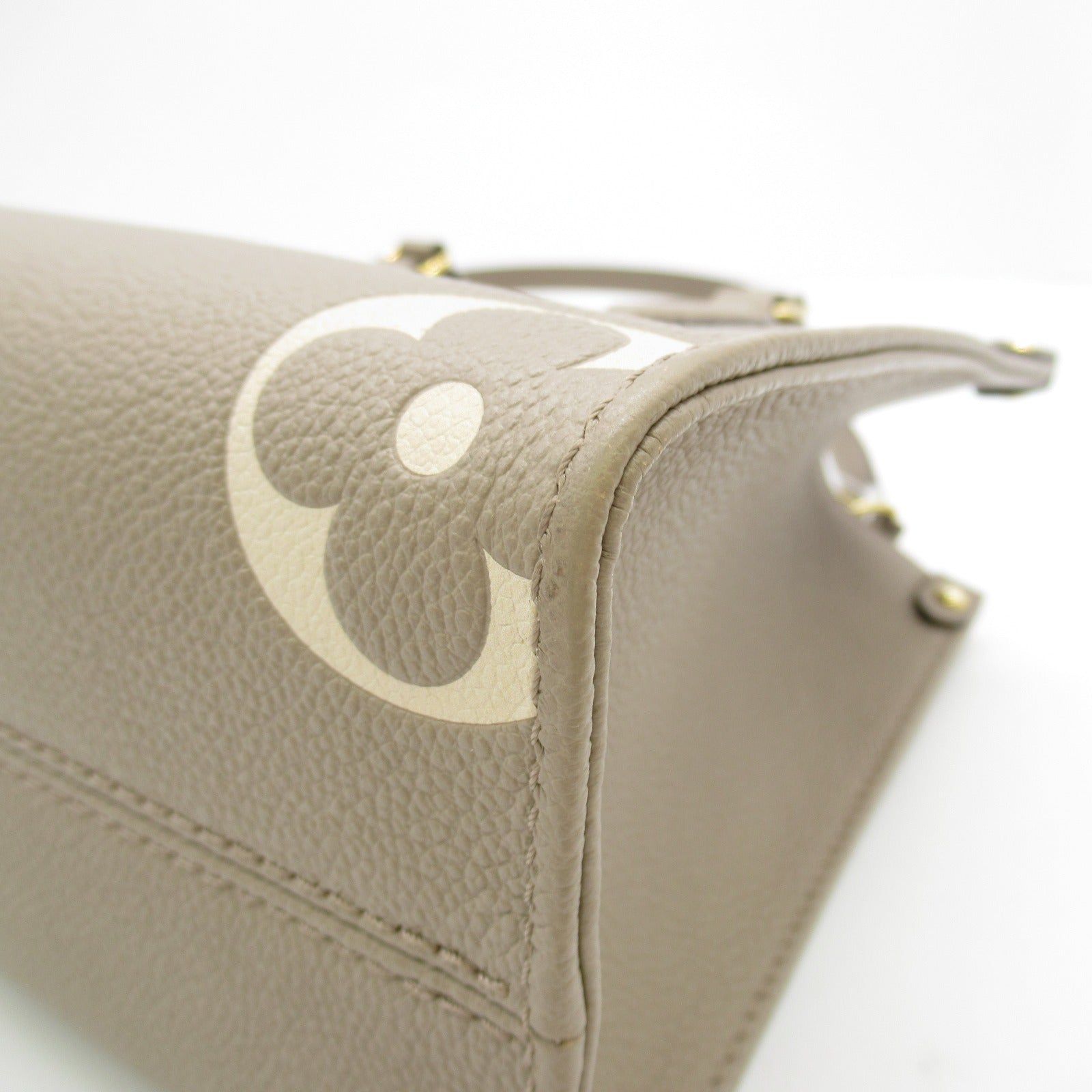 LOUIS VUITTON Monogram Empreinte OnTheGo PM金扣手挽肩背兩用袋米色
