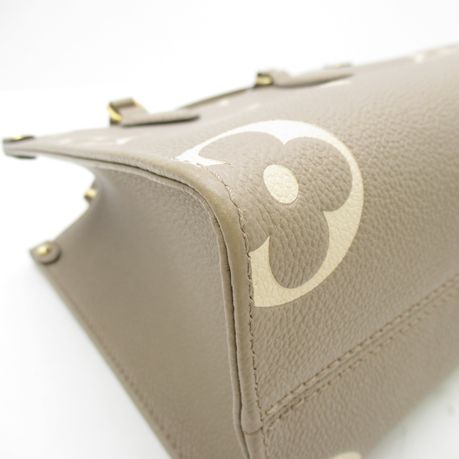 LOUIS VUITTON Monogram Empreinte OnTheGo PM金扣手挽肩背兩用袋米色