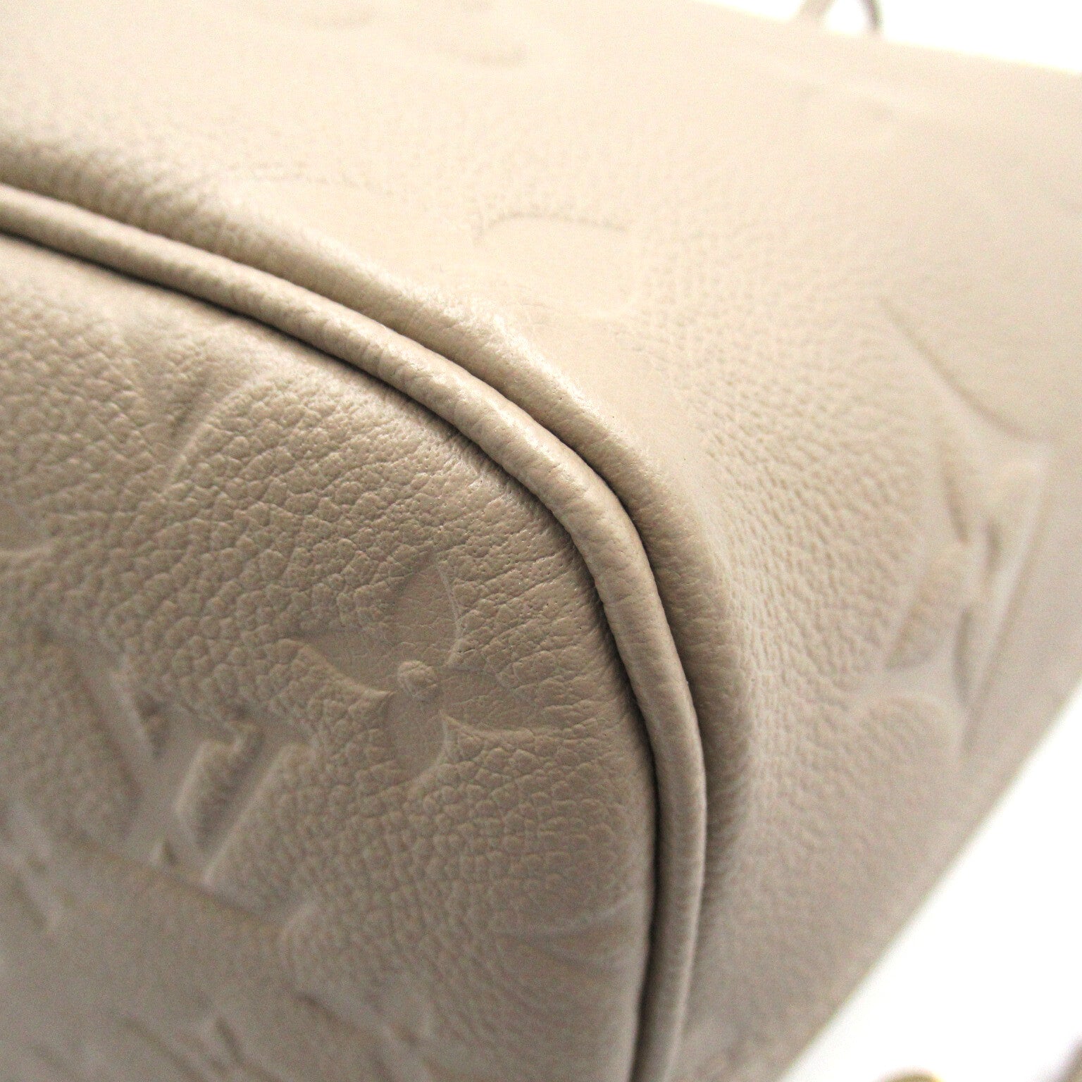 LOUIS VUITTON Monogram Empreinte Neverfull MM金扣手挽袋米色
