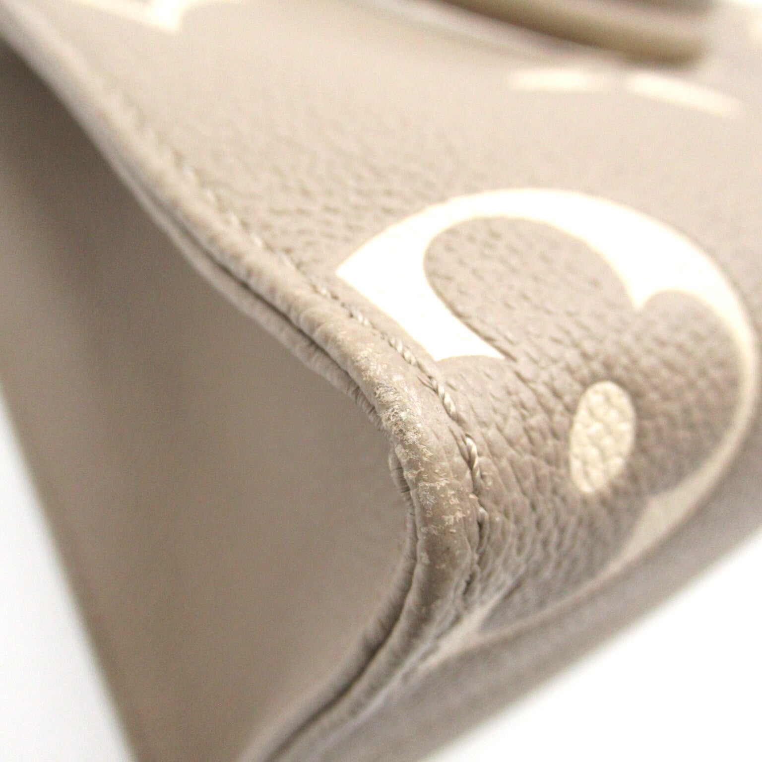 LOUIS VUITTON Monogram Empreinte OnTheGo PM金扣手挽肩背兩用袋斑鳩灰色/奶油色