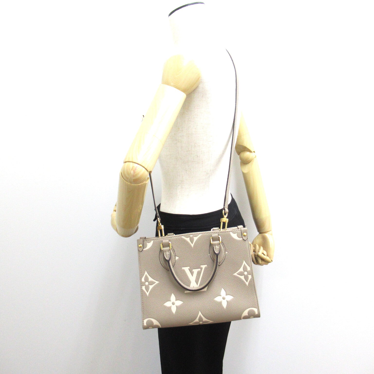 LOUIS VUITTON Monogram Empreinte OnTheGo PM金扣手挽肩背兩用袋斑鳩灰色/奶油色