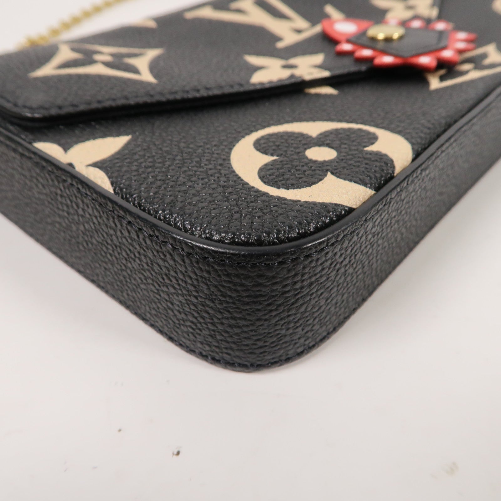 LOUIS VUITTON Monogram Empreinte Felicie Pochette金扣鏈帶肩背袋黑色/米色