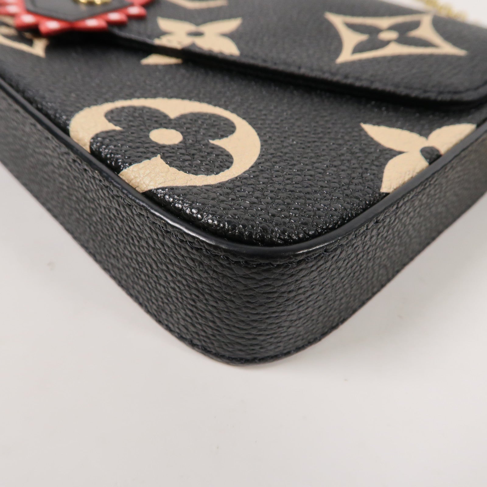 LOUIS VUITTON Monogram Empreinte Felicie Pochette金扣鏈帶肩背袋黑色/米色