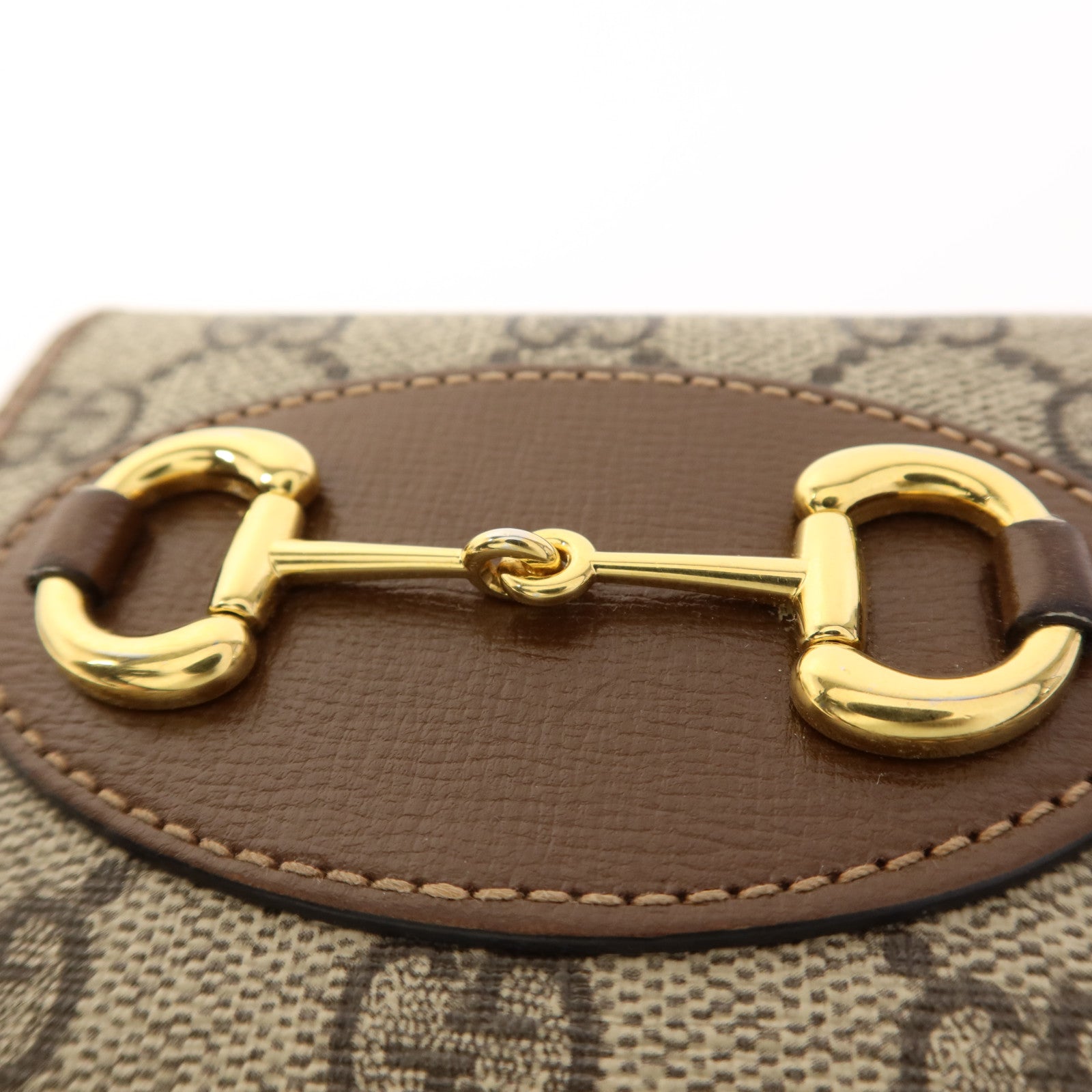 GUCCI 塗層帆布Horsebit 1955金扣錢包