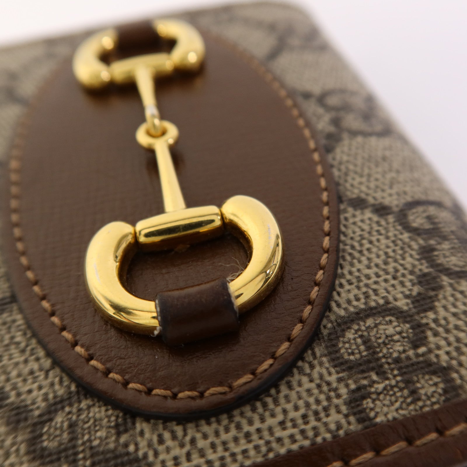 GUCCI 塗層帆布Horsebit 1955金扣錢包
