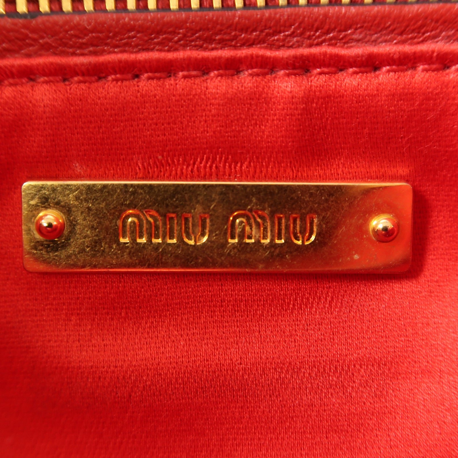 Miu Miu 【激減優惠】牛皮皮革Pouch金扣手拿包