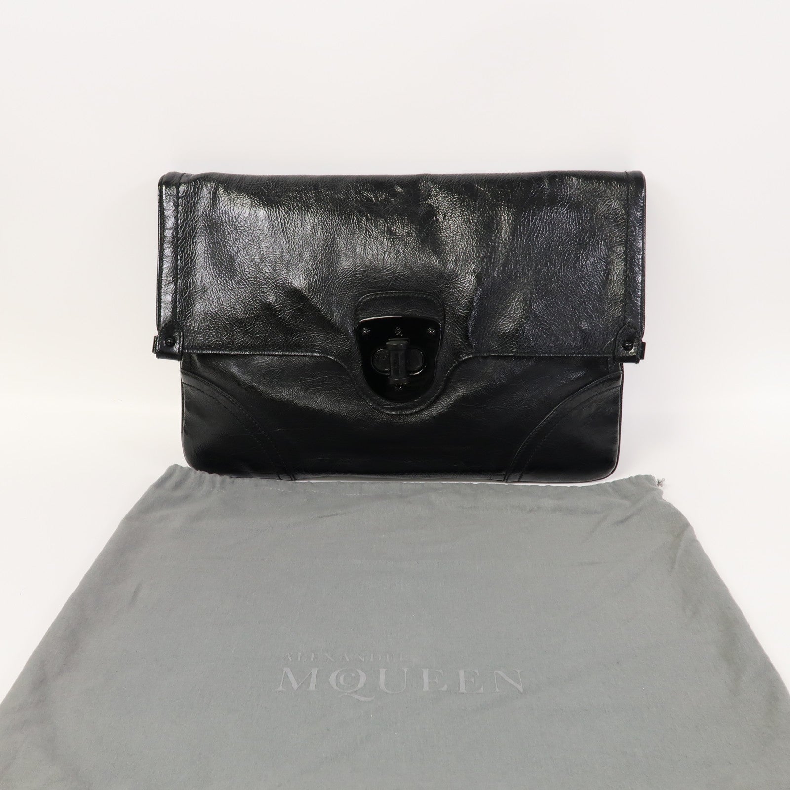 Alexander McQueen 漆皮皮革Mcqueen Clutch手拿包黑色