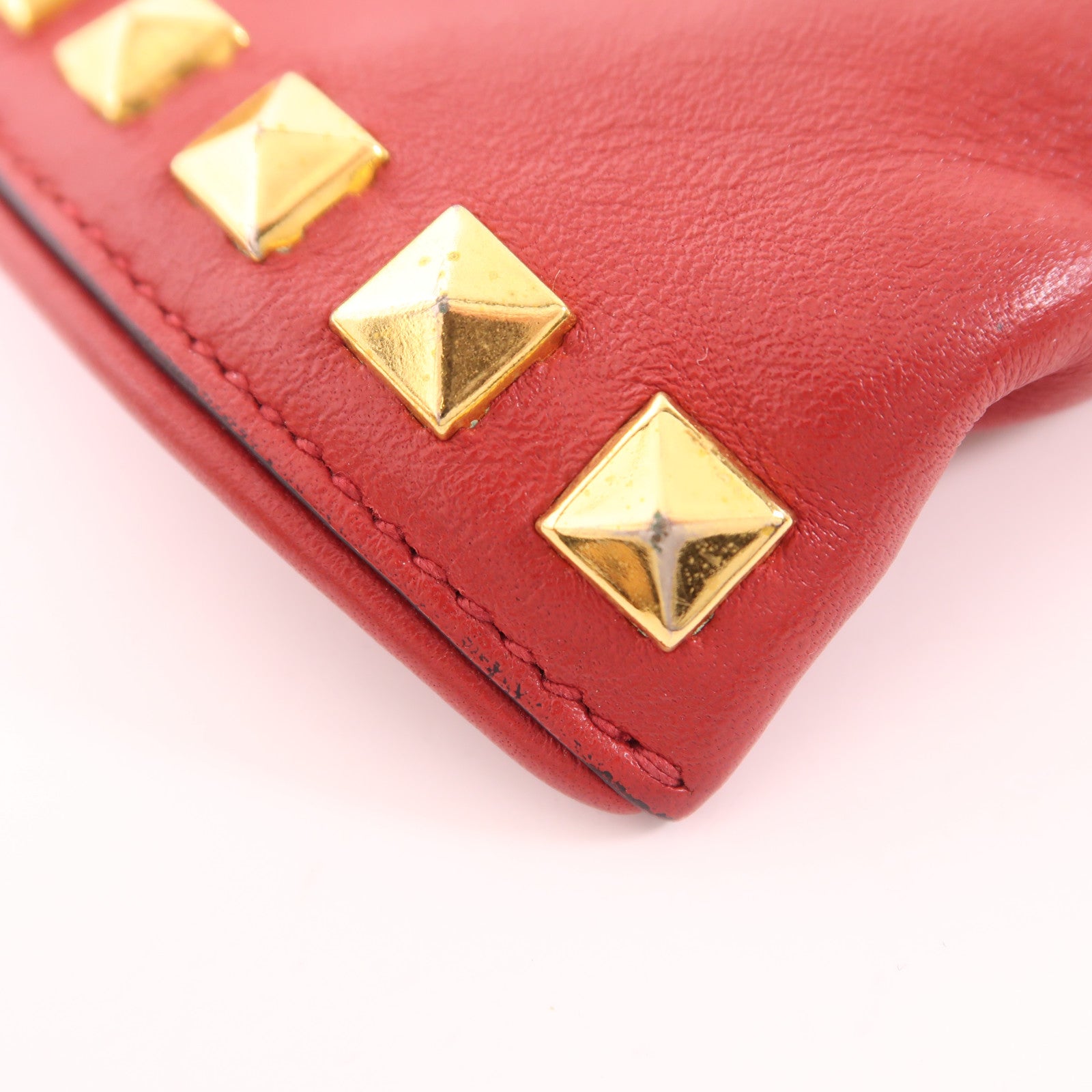 Miu Miu 牛皮皮革Pouch金扣手拿包