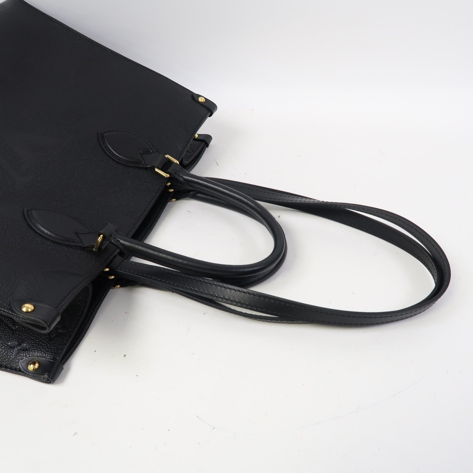 LOUIS VUITTON Monogram Empreinte On The Go MM金扣手挽肩背兩用袋黑色
