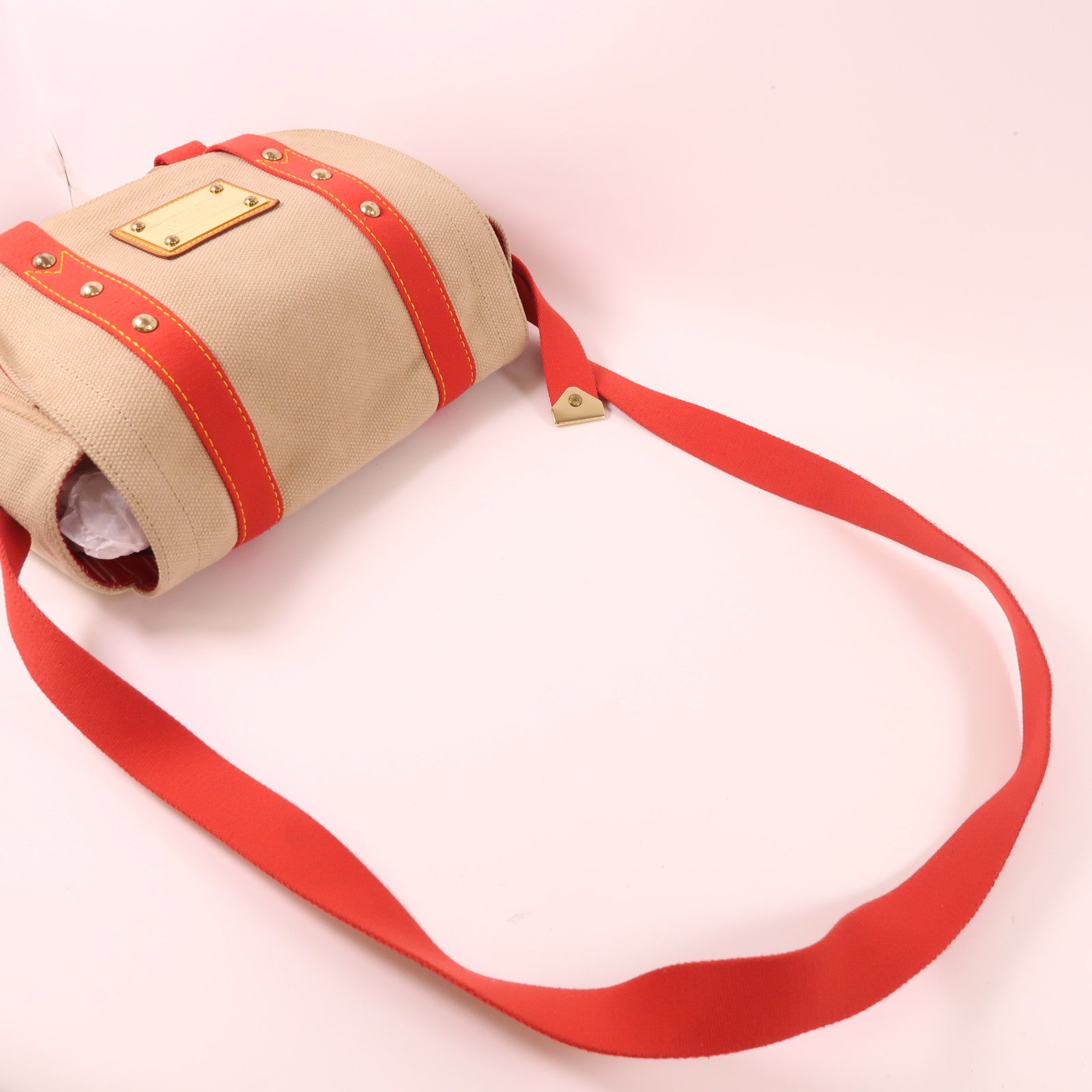 LOUIS VUITTON 帆布Antigua Besace PM金扣肩背袋