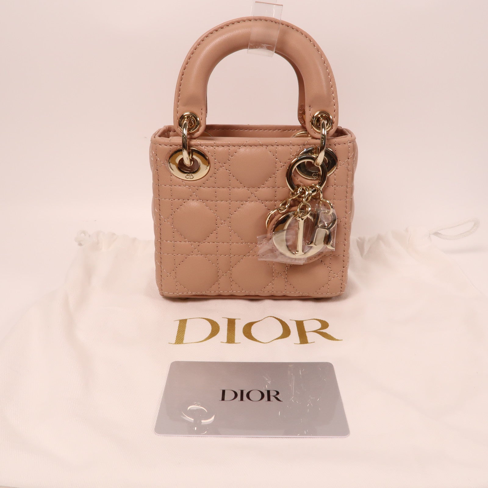 Dior 羊皮皮革Lady Dior Micro Bag金扣手拿包玫瑰色