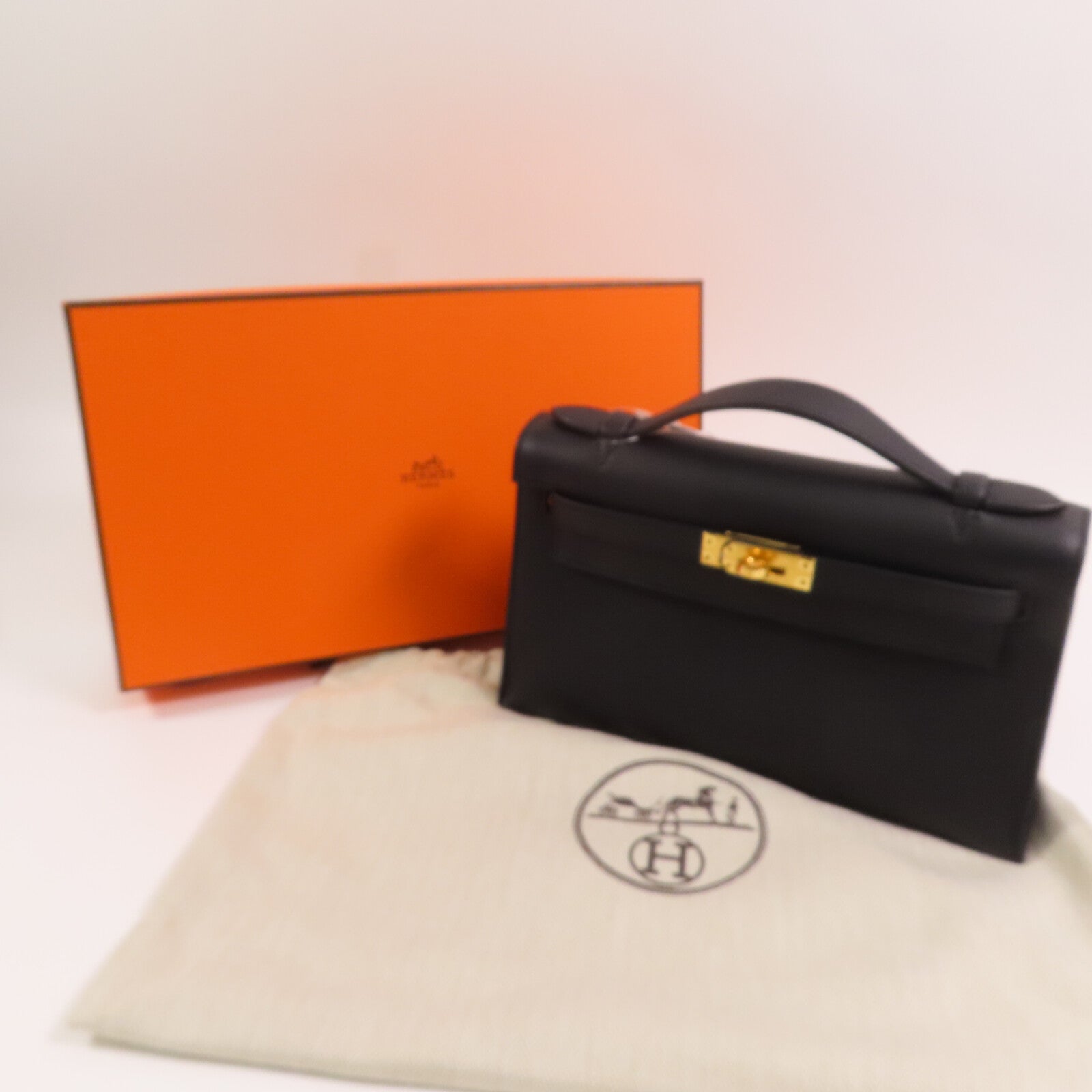 HERMES 【激減優惠】Swift皮革Kelly Pochette金扣手挽袋Noir