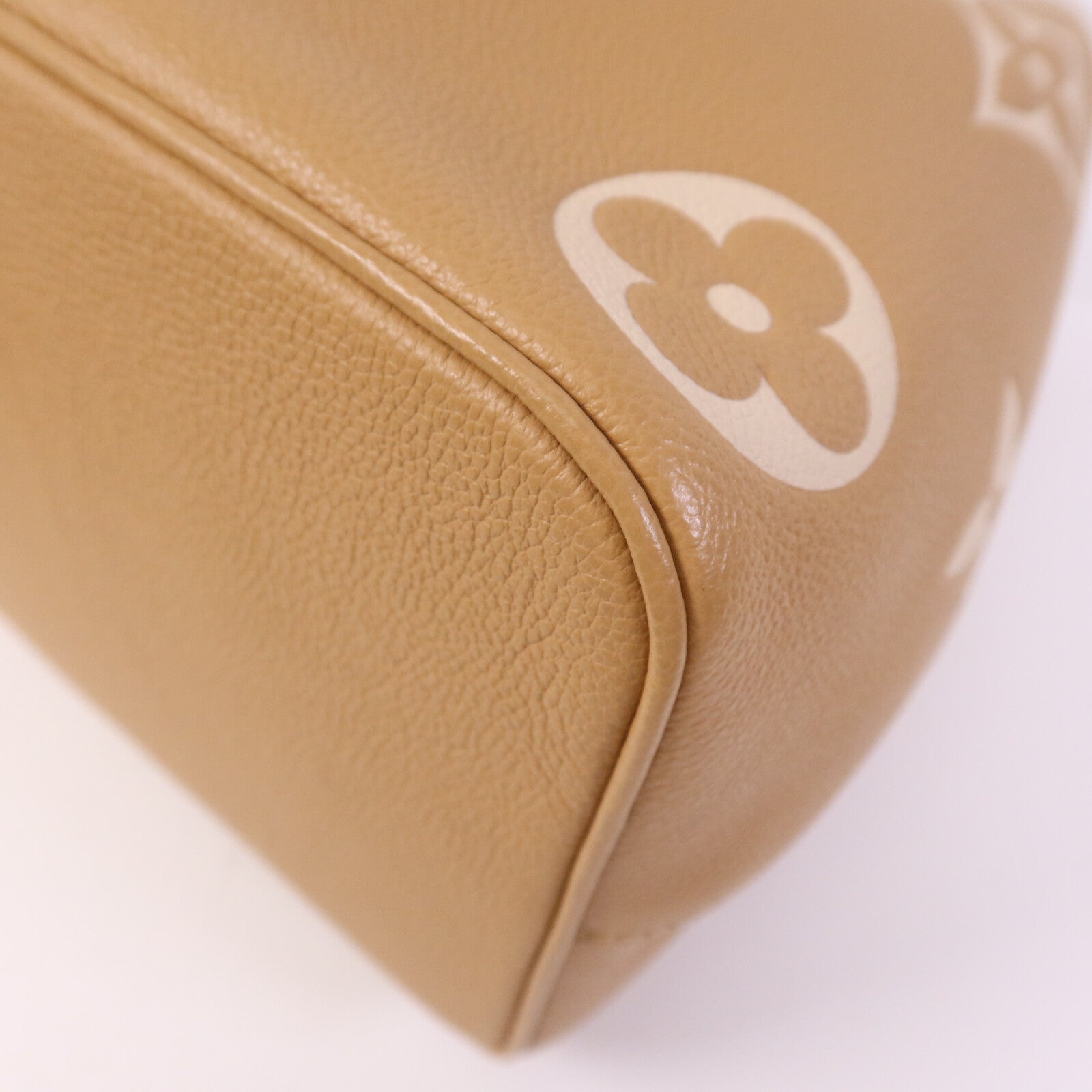 LOUIS VUITTON Monogram Empreinte Neo Noe金扣手挽帥背兩用袋