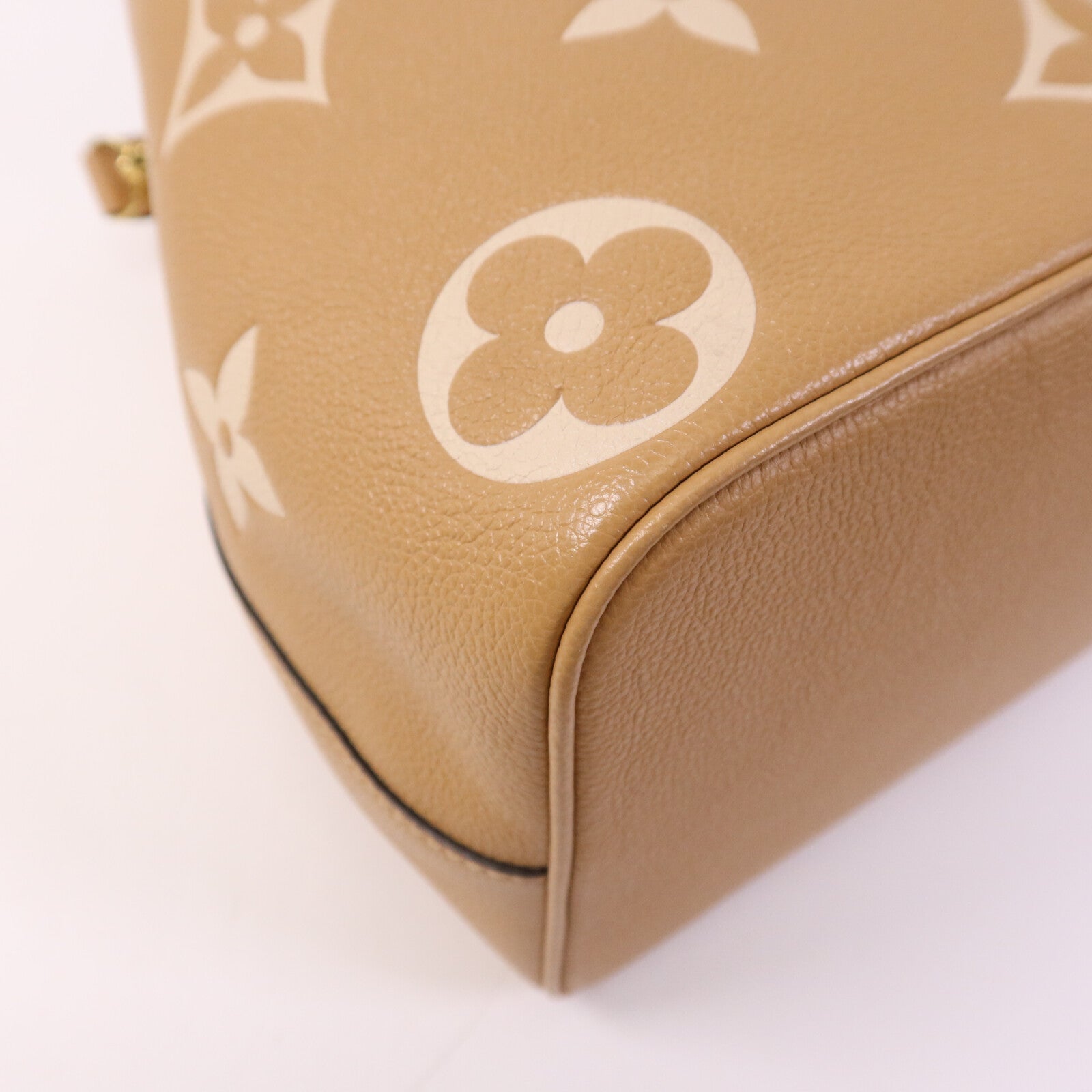 LOUIS VUITTON Monogram Empreinte Neo Noe金扣手挽帥背兩用袋