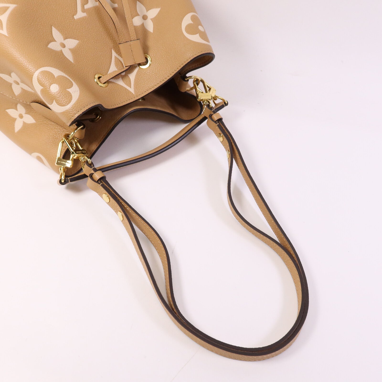 LOUIS VUITTON Monogram Empreinte Neo Noe金扣手挽帥背兩用袋