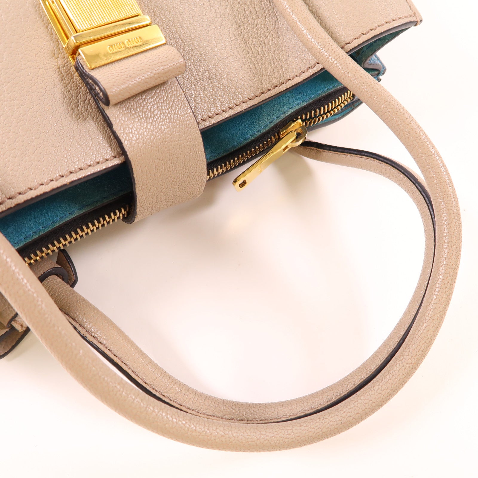 Miu Miu 牛皮皮革Handbag金扣手挽袋