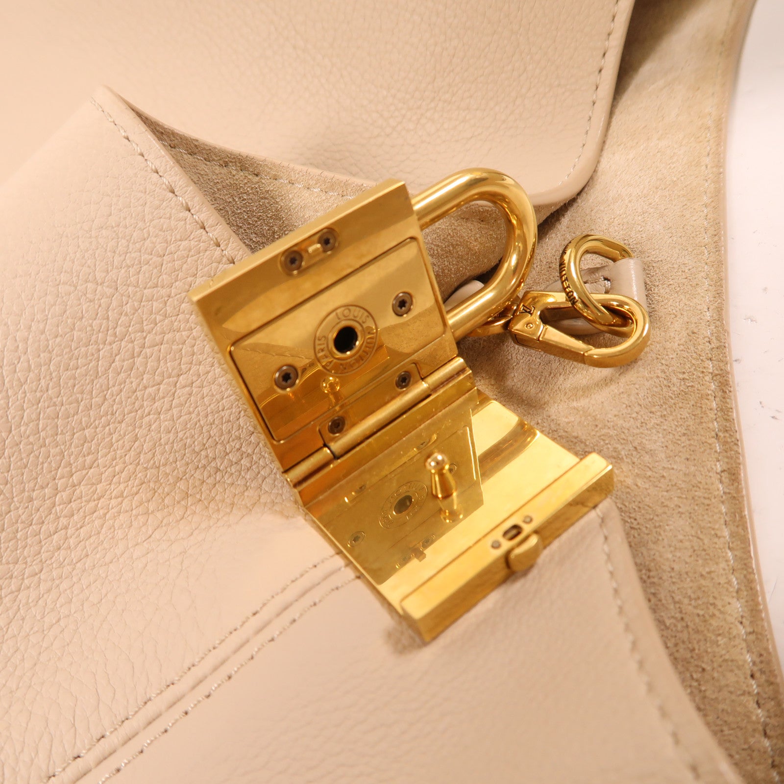 LOUIS VUITTON 牛皮皮革Low Key Hobo MM金扣肩背袋