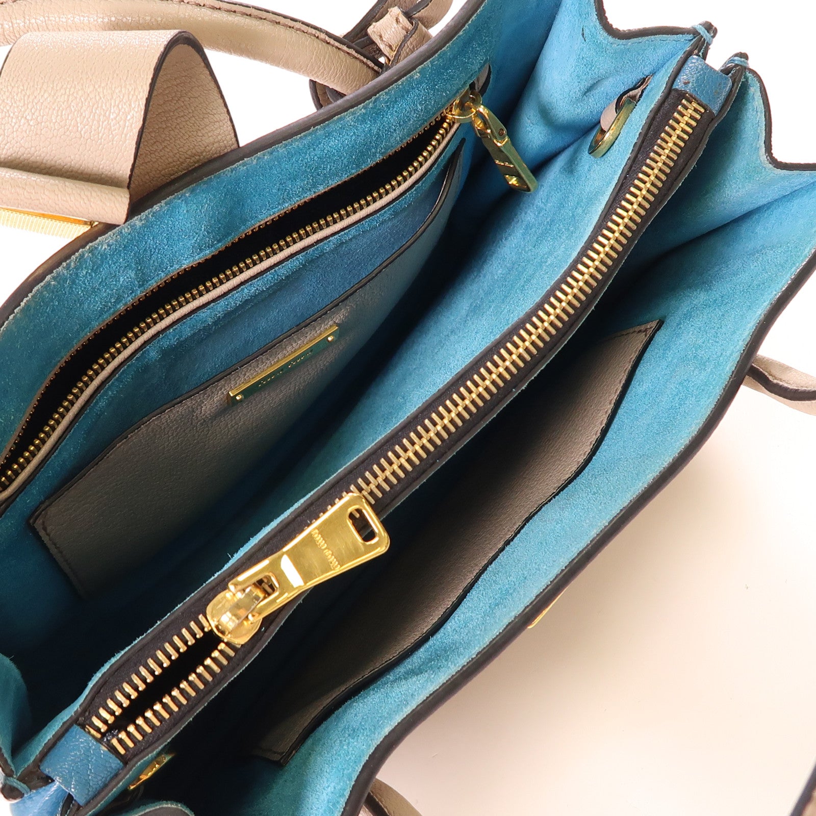 Miu Miu 牛皮皮革Handbag金扣手挽袋