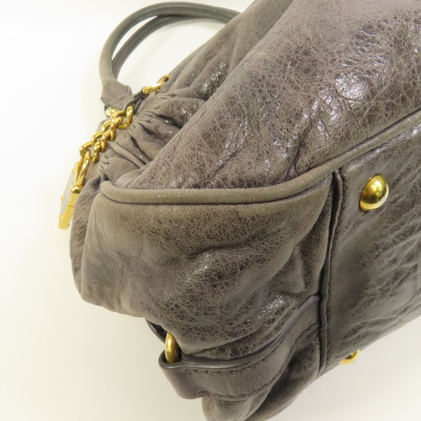 Miu Miu 牛皮皮革Handbag金扣手挽袋