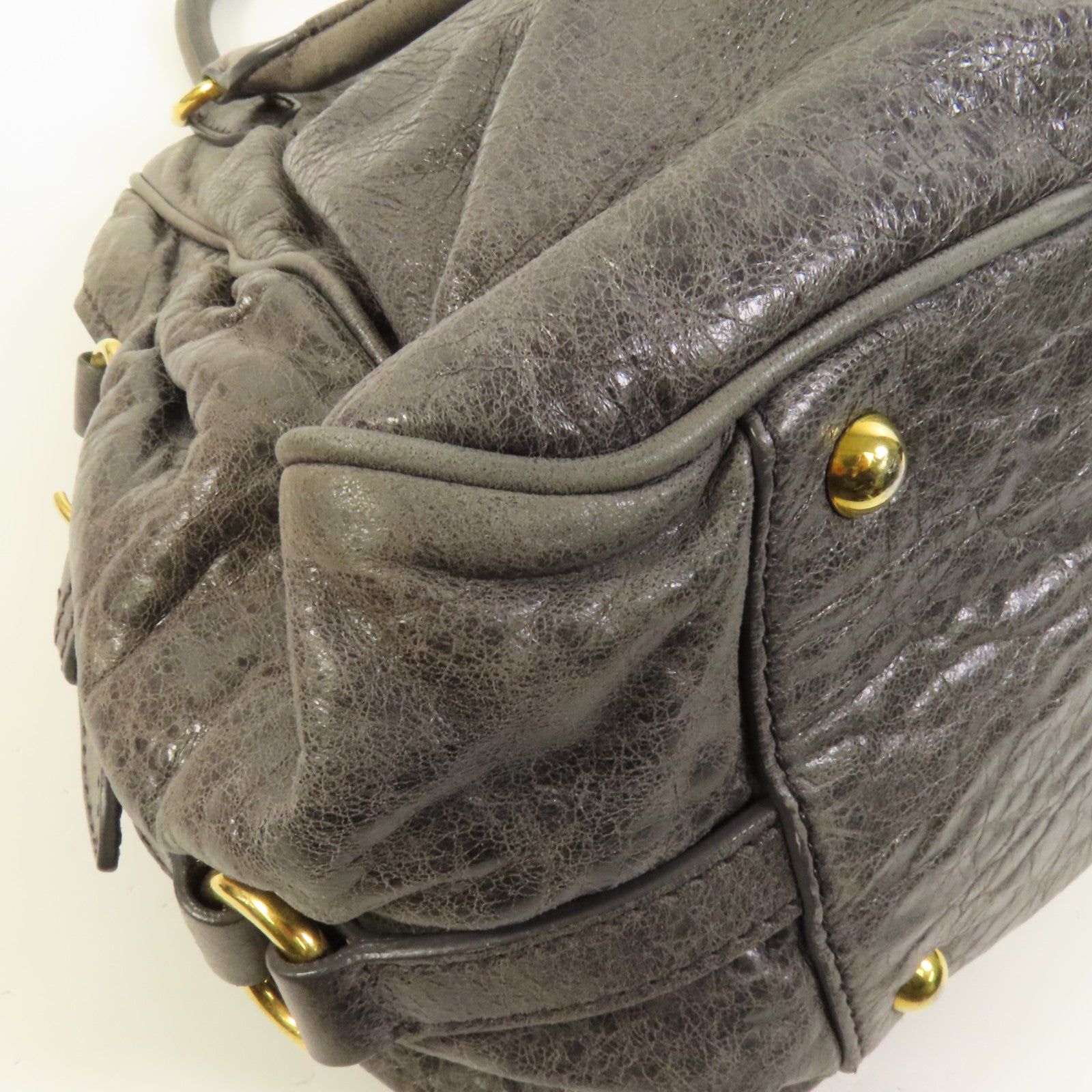 Miu Miu 牛皮皮革Handbag金扣手挽袋