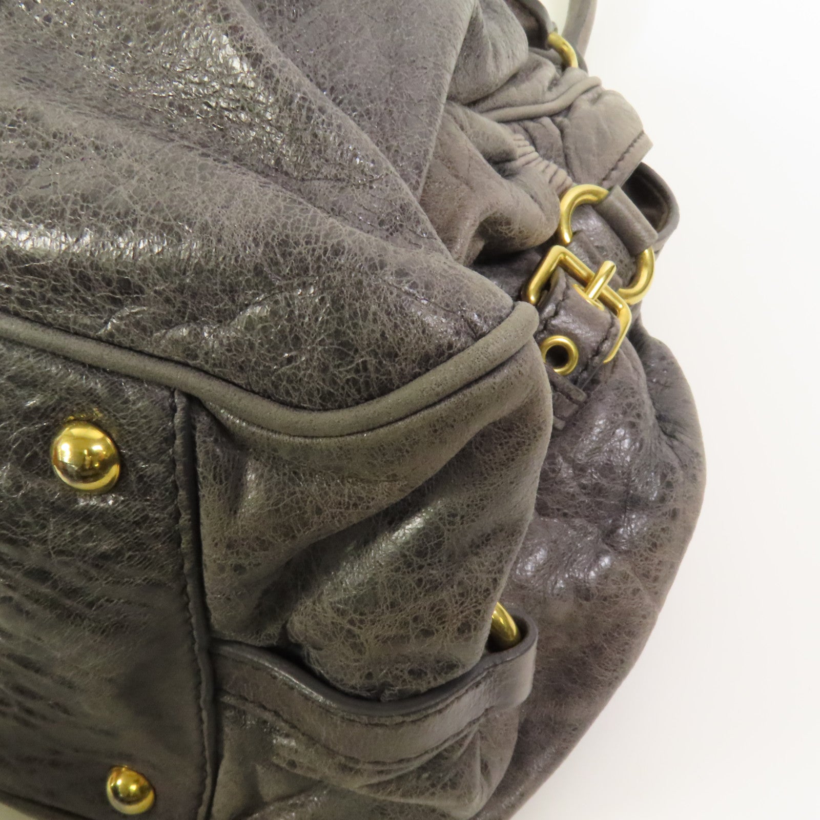 Miu Miu 牛皮皮革Handbag金扣手挽袋