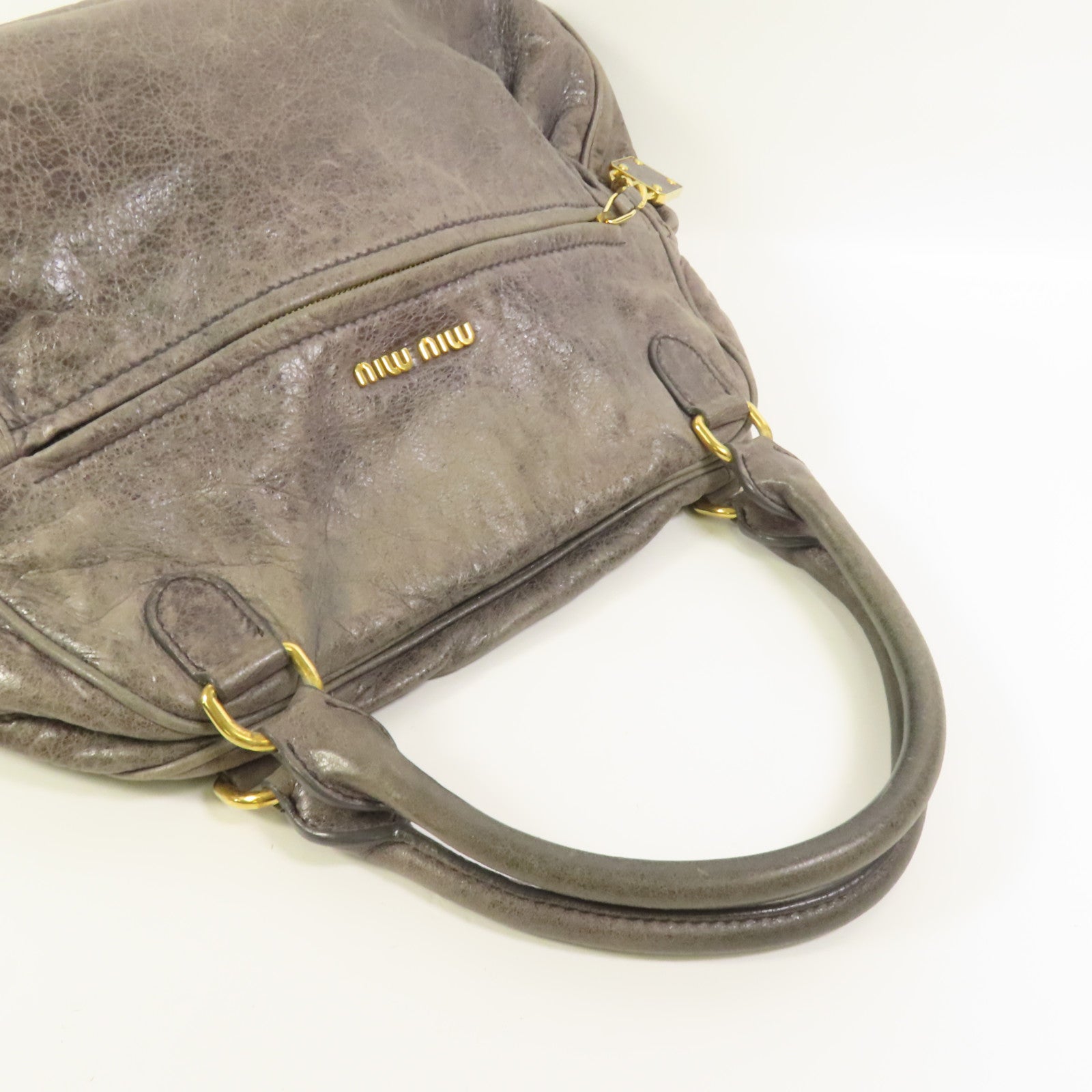 Miu Miu 牛皮皮革Handbag金扣手挽袋