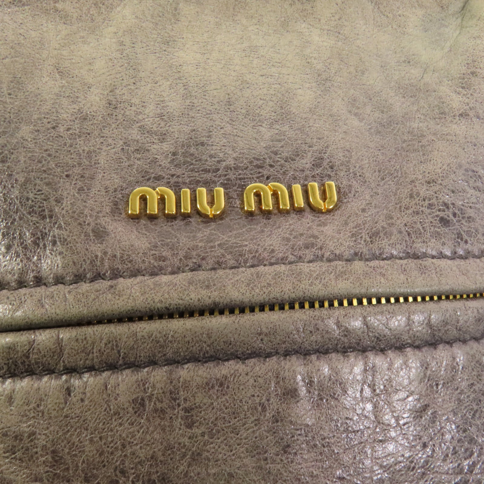 Miu Miu 牛皮皮革Handbag金扣手挽袋
