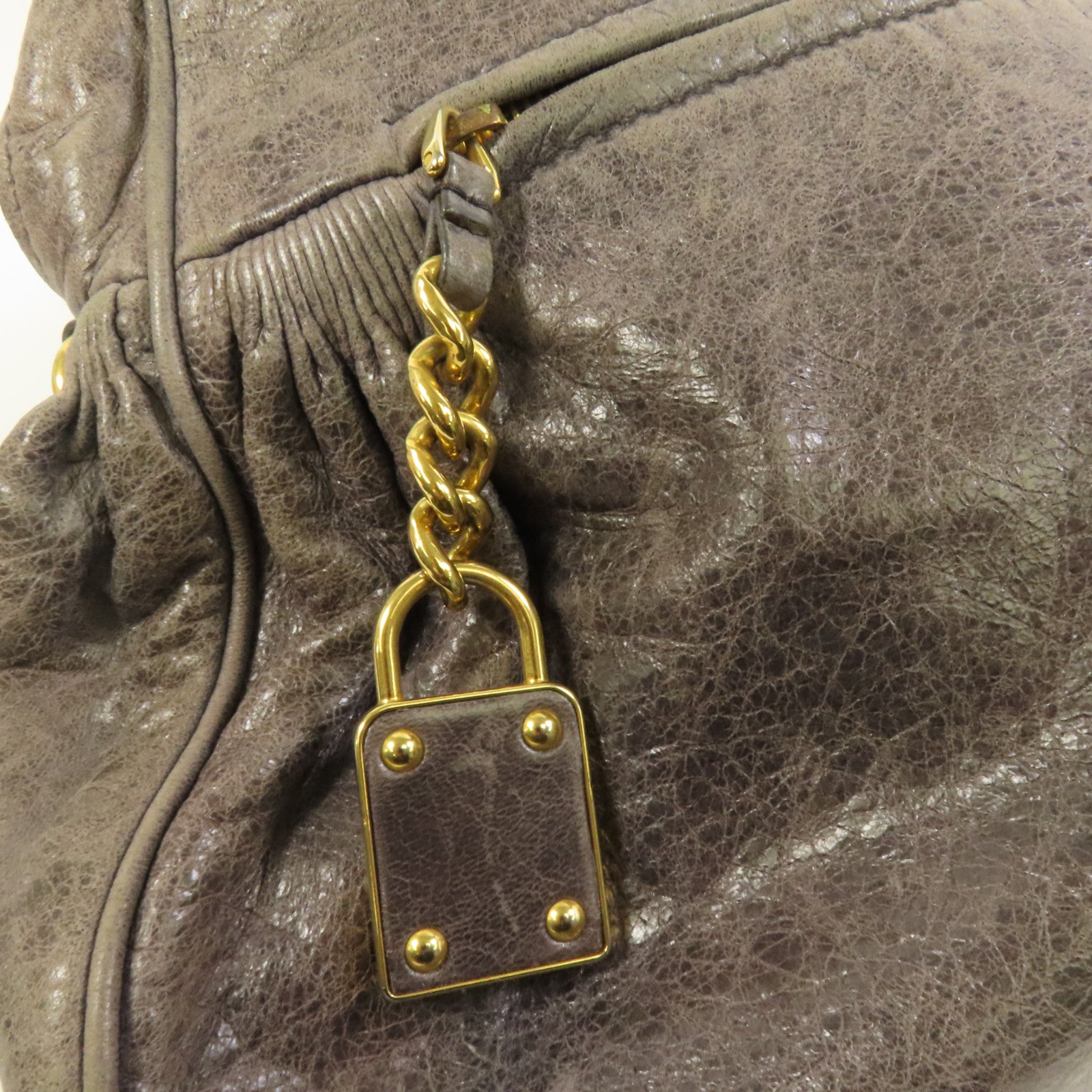 Miu Miu 牛皮皮革Handbag金扣手挽袋