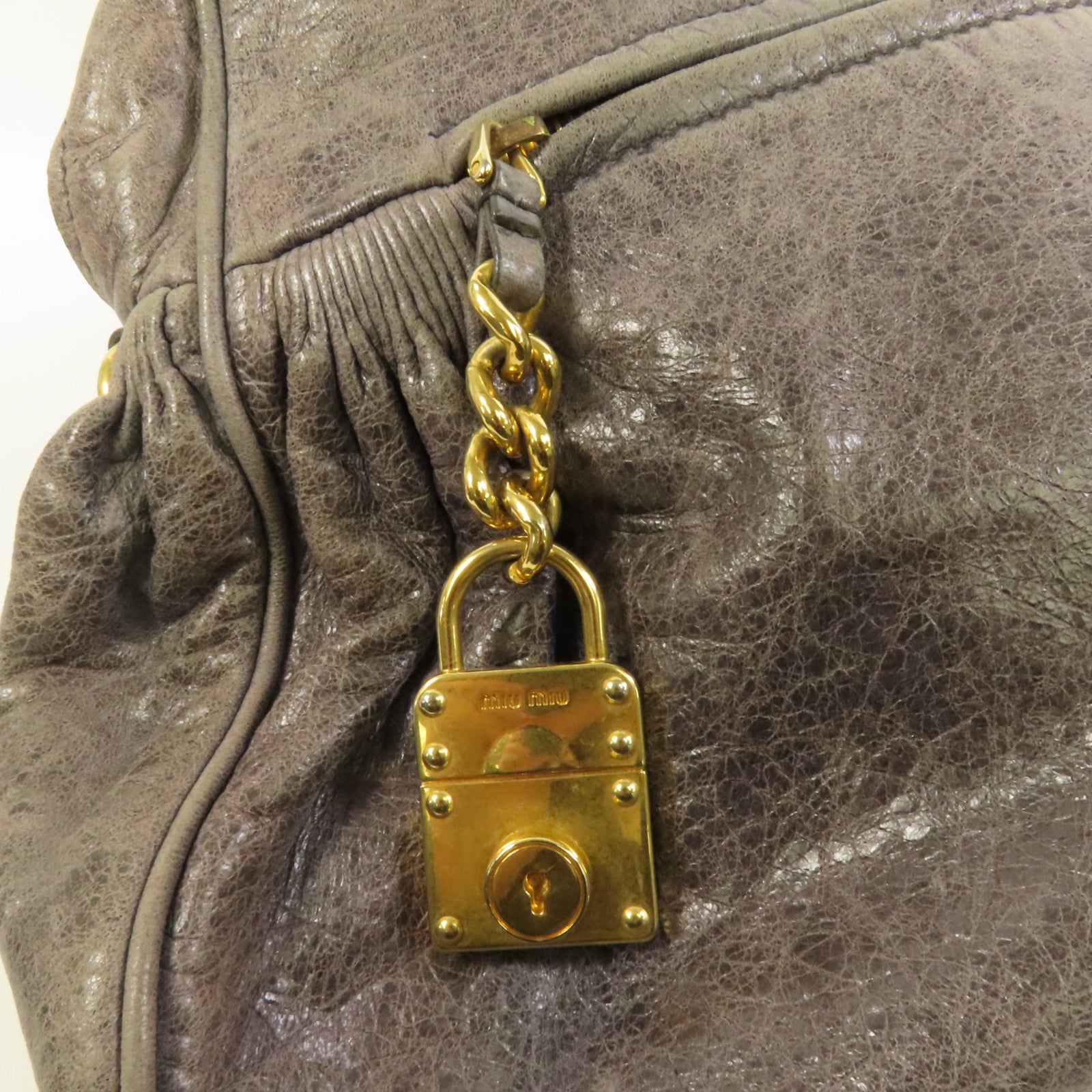 Miu Miu 牛皮皮革Handbag金扣手挽袋