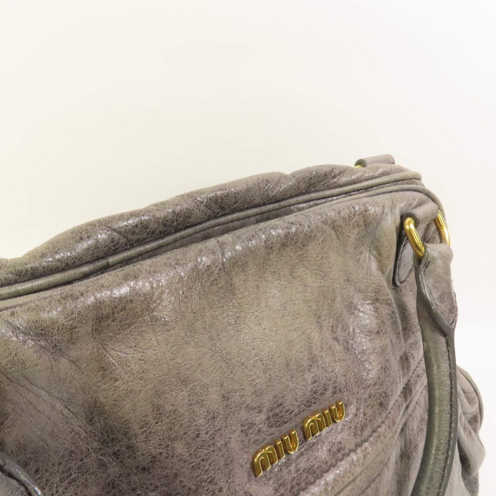 Miu Miu 牛皮皮革Handbag金扣手挽袋