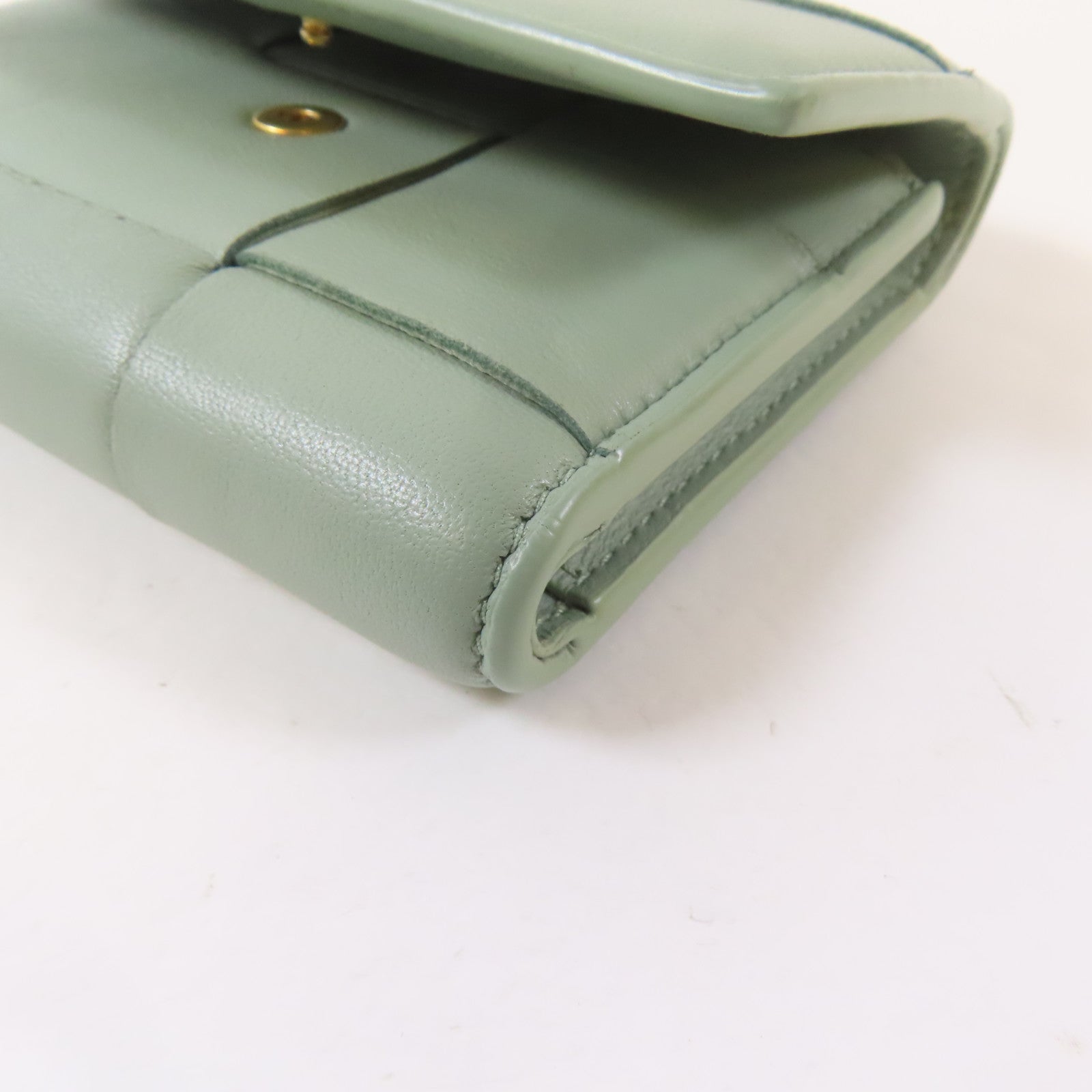 BOTTEGA VENETA 織紋羊皮皮革Trifold Wallet金扣錢包淺綠色