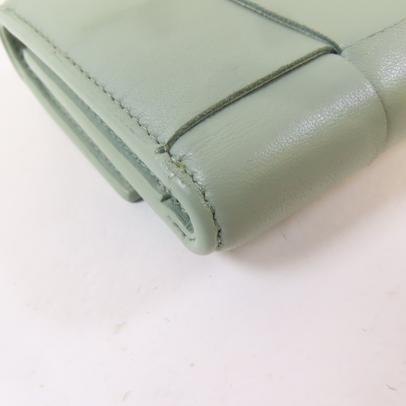 BOTTEGA VENETA 織紋羊皮皮革Trifold Wallet金扣錢包淺綠色