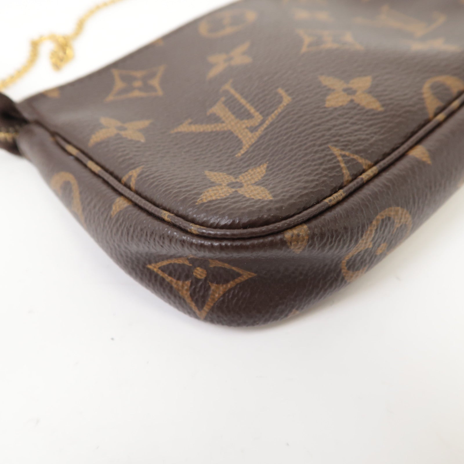 LOUIS VUITTON Monogram Mini Pochette Accessoires金扣手挽袋啡色