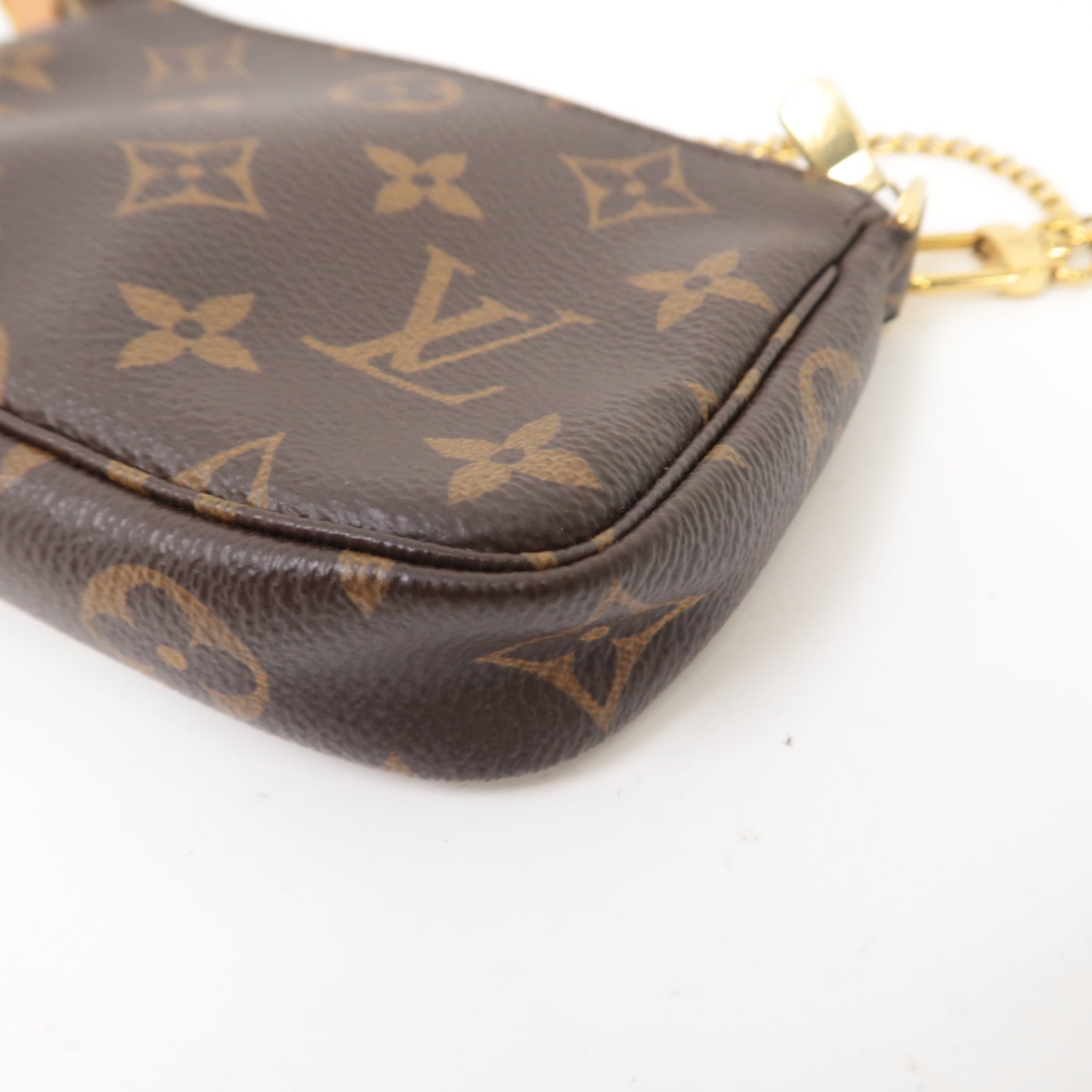 LOUIS VUITTON Monogram Mini Pochette Accessoires金扣手挽袋啡色