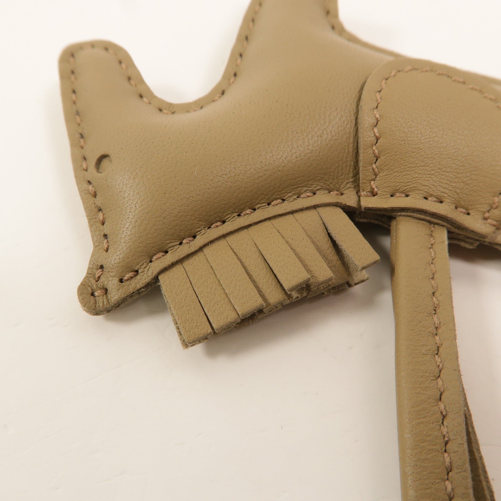 HERMES Milo皮革Rodeo PM掛飾Beige Marfa
