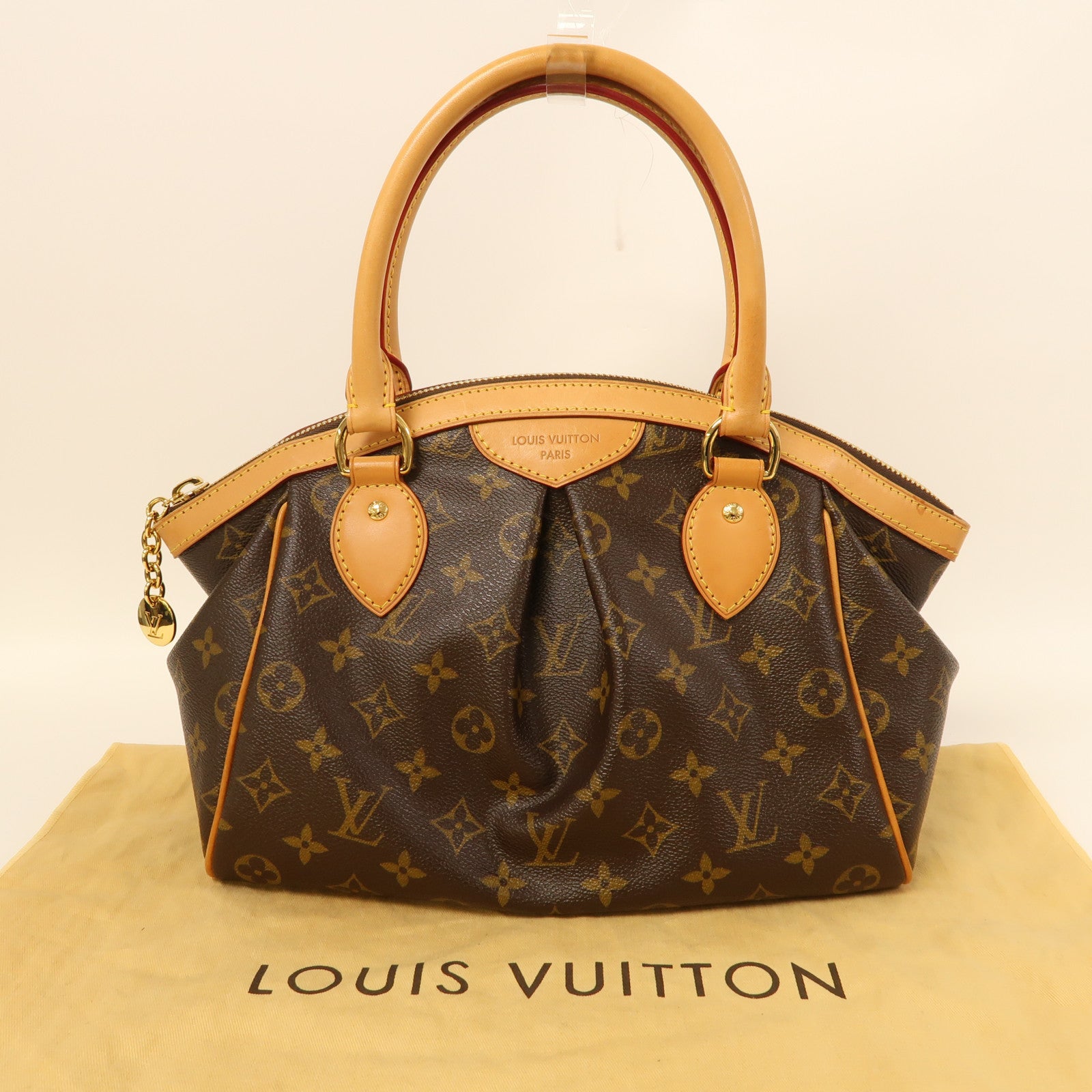 LOUIS VUITTON Monogram Tivoli PM金扣手挽袋棕色