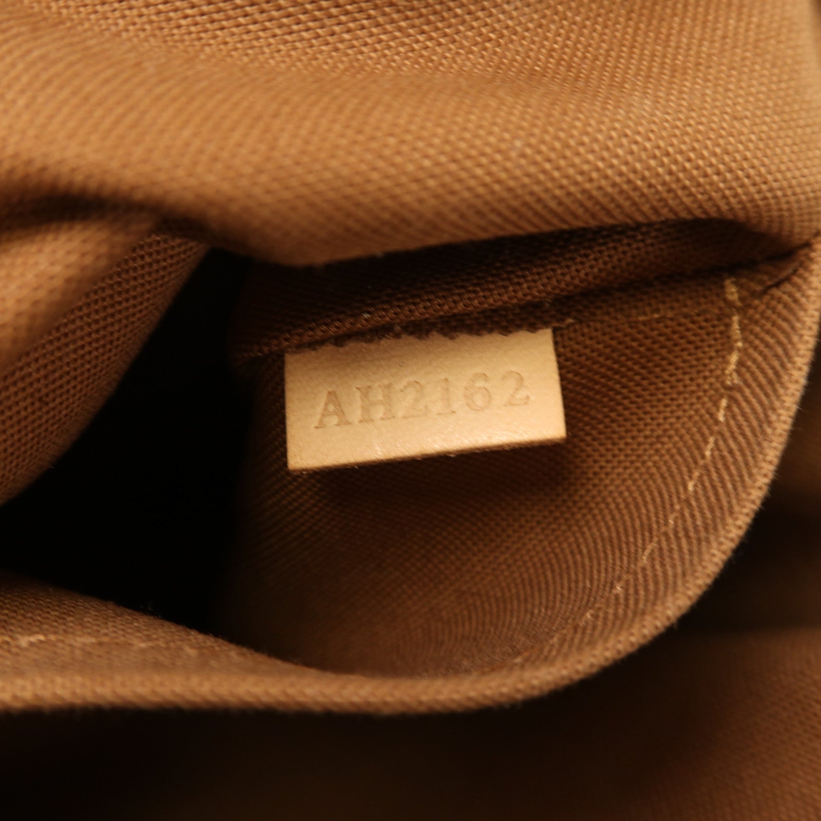 LOUIS VUITTON Monogram Tivoli PM金扣手挽袋棕色
