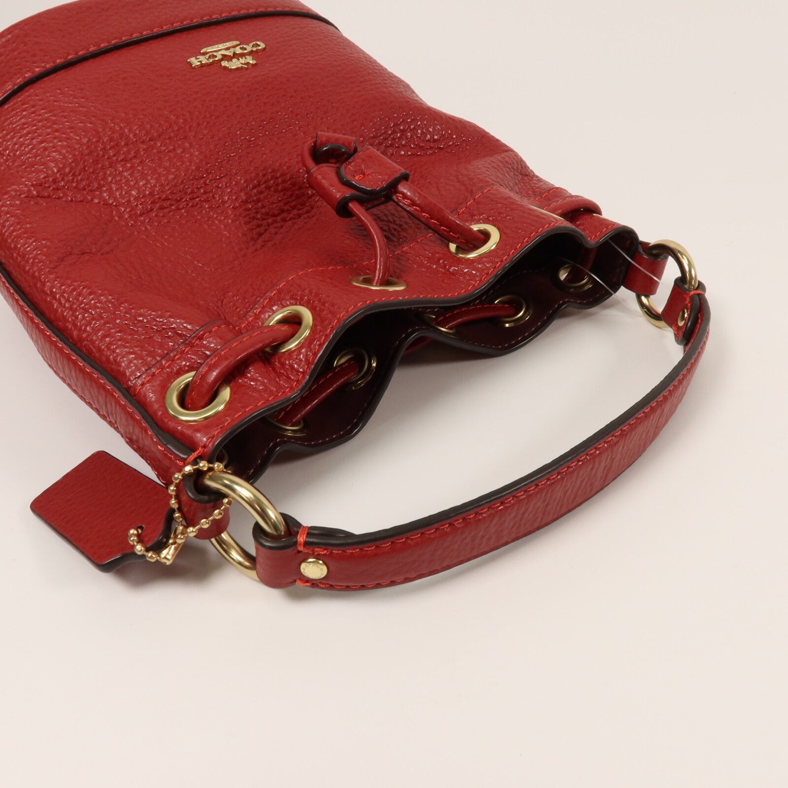 COACH 牛皮皮革Dempsey Drawstring Bucket Bag手挽肩背兩用袋