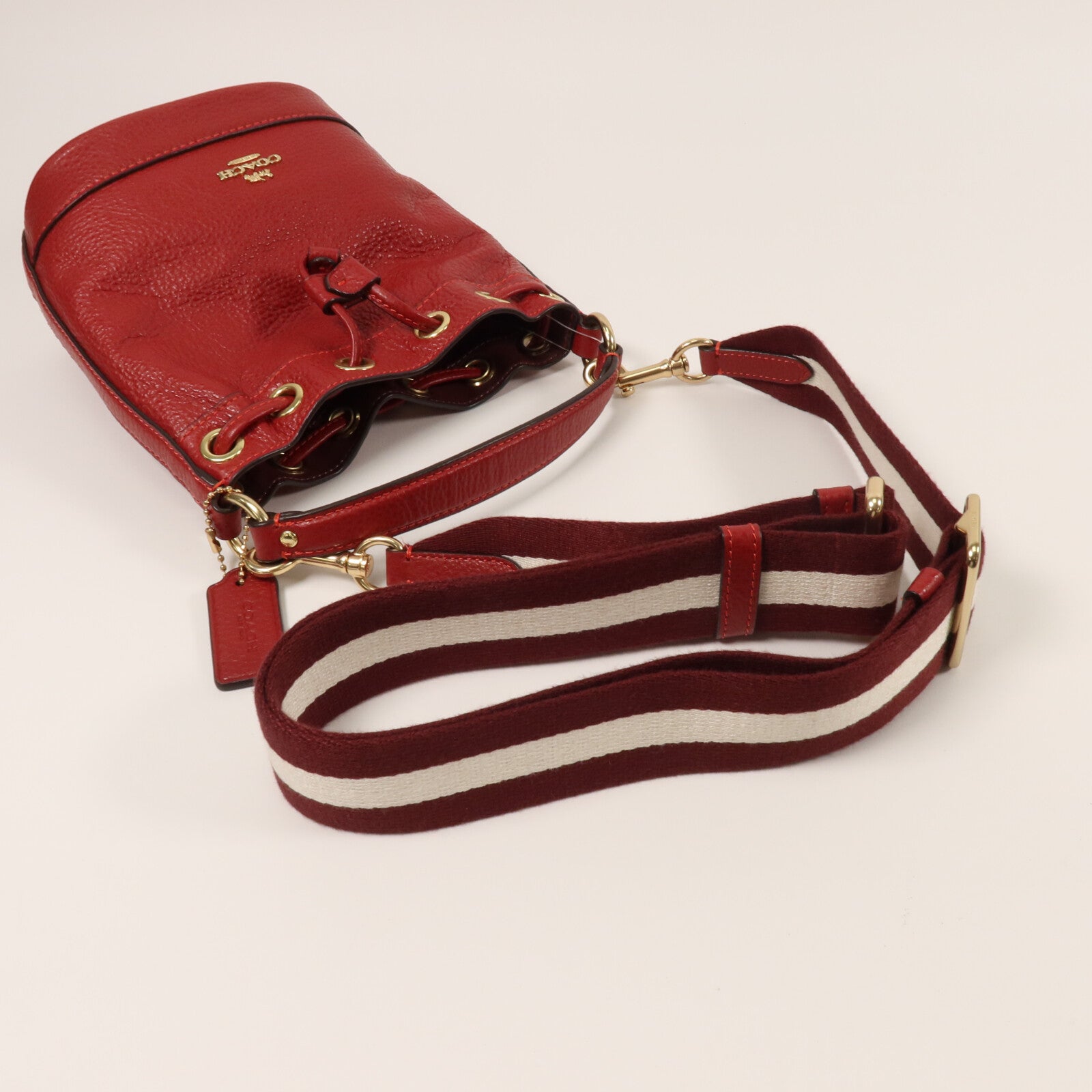 COACH 牛皮皮革Dempsey Drawstring Bucket Bag手挽肩背兩用袋